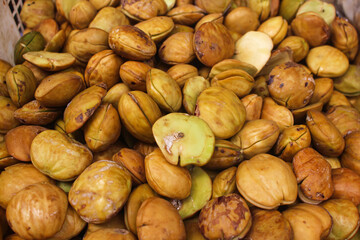 Dogfruit an Indonesia sell in market commonly called jengkol or jering. Consumed in Thailand, Malaysia, Myanmar, and Indonesia and prepared by frying, boiling, or roasting and are also eaten raw.