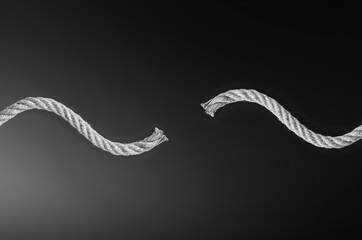 Frayed rope break concept, problem, precarious situation - obrazy, fototapety, plakaty