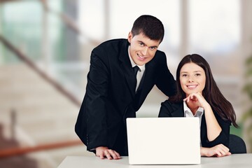 Happy business people work together