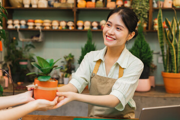 Portrait of Asian woman working in a plant shop