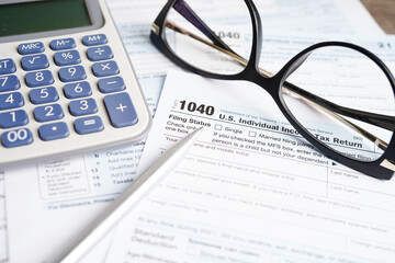 Tax form 1040 U.S. Individual Income Tax Return, business finance concept.
