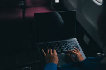 Using mobile and laptop, Thoughtful asian people female person onboard, airplane window, perfectly capture the anticipation and excitement of holiday travel. chinese, japanese people.