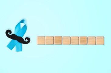 Movember concept men's health  blue ribbon