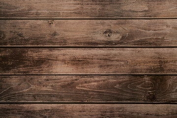 Fototapeta na wymiar Background of brown horizontal unpainted old wooden planks