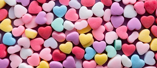 Zelfklevend Fotobehang Valentine's Day candy with colorful conversation hearts. © AkuAku
