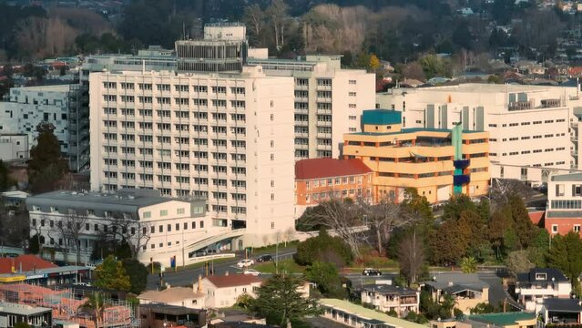 Aerial: Downtown Hamilton Hospital, Waikato, New Zealand. 21 August 2023