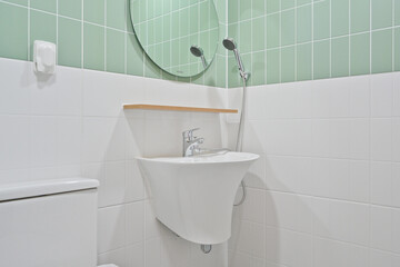 Bathroom decorated with mint-colored tiles