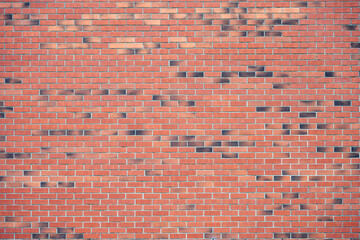 Background from a large red brick wall
