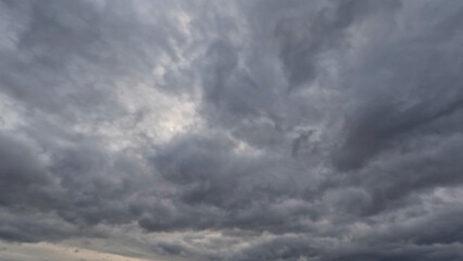 nice cloudscape of sky with heavy rain or snow clouds background - photo of nature