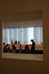 people are doing artwork in a conference hall