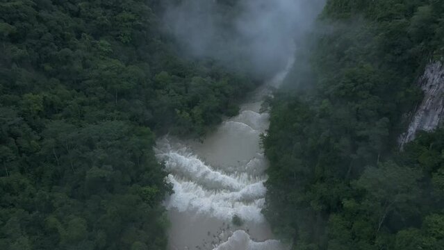 Top down view of semuc champey waterfall during rainy season, aerial