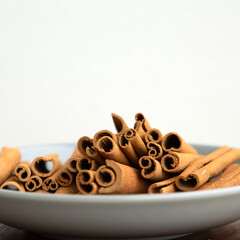 cinnamon sticks on a light background