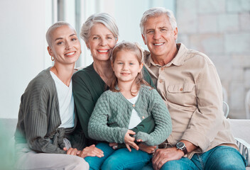 Grandparents, girl and mother in portrait on sofa with hug, care or bonding with love in family...