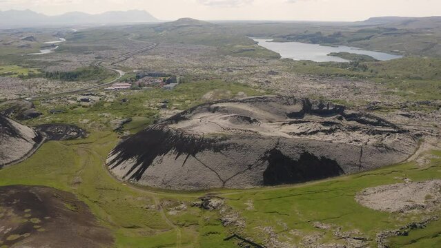 Aerial video circling Raudbrok crater near Lake Hre&eth;avatn in western Iceland