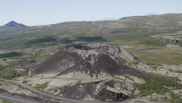 Flying up and looking down into the volcanic crater for Gradbrok Crater in Iceland