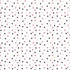 A pattern of small hearts of pink, brown and , beige color on a white background.