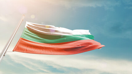 Bulgaria national flag waving in beautiful sky. The symbol of the state on wavy silk fabric. - obrazy, fototapety, plakaty