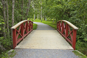 Footbridge in public park in Lulea, Sweden, Europe
