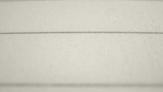 Macro Detail of a Line on Notebook Paper. Probe lens