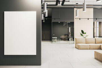 Modern office lobby interior with beige couch, concrete flooring and white mock up banner on wall. 3D Rendering.