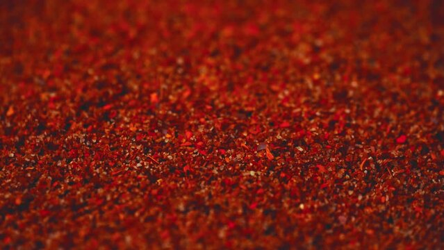 Rotating close up of tajin seasoning used for micheladas