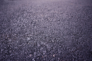 Close-up view of the black asphalt