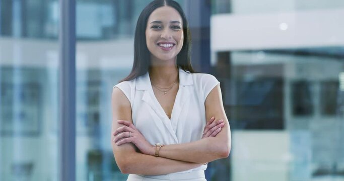 Businesswoman, arms crossed and smile with face, office and professional, accountant and happiness. Confident, young and workplace for career, finance clerk and woman for startup, job and elegant