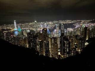 Fototapeta premium View of Hong Kong and Kowloon form top of Victoria Peak. Blue hour dusk to sun down.