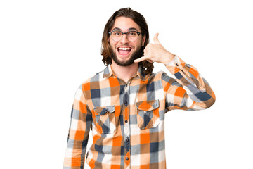 Young handsome man over isolated chroma key background making phone gesture. Call me back sign