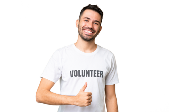 Young volunteer caucasian man over isolated chroma key background giving a thumbs up gesture