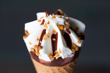 Cream and chocolate ice cream cone