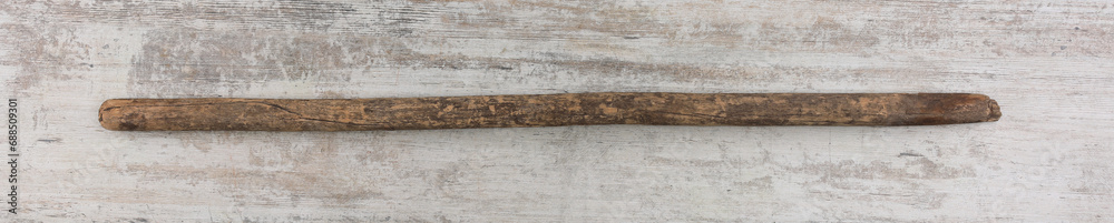 Wall mural old wooden stick on wooden background