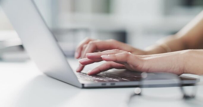 Hands, business woman and typing on laptop for planning research, information and administration in office. Closeup, worker and computer keyboard for online report, editing email and digital software