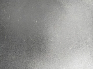 Closeup of light black gray wool fabric texture for background. gray background. gray textile