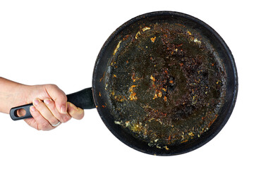 Hand hold frying pan with the leftover grease isolated on a white background. - obrazy, fototapety, plakaty