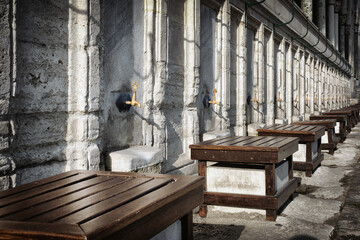 Beautiful bronze taps for ablution of Muslim believers at the entrance to the courtyard of the Sulaymaniyah Mosque.