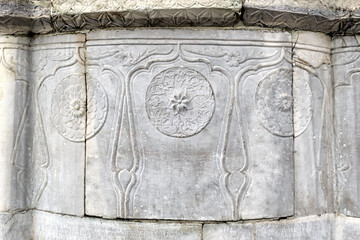 Close-up of decorative ornaments carved in Arabic style marble.