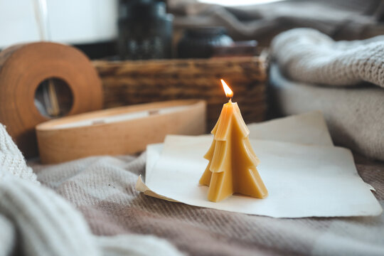Beeswax Christmas tree candle, cozy photo