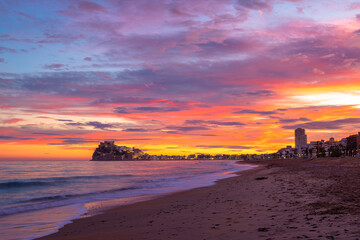 Sunset on Peniscola beach in Spain
