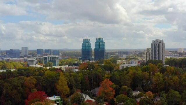 Aerial shot slowly descending facing the King and Queen towers in Atlanta Georgia