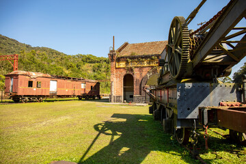 Park with old train called Funicular, old locomotives and station and engine room