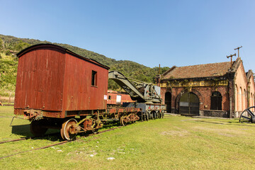 Fototapeta na wymiar Park with old train called Funicular, old locomotives and station and engine room