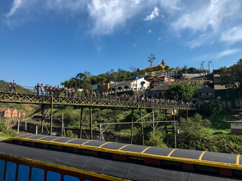 Paranapiacaba, Santo Andre, Sao Paulo, Brazil - July 29, 2018: View of old railway station walkway with old trains and locomotives in Paranapiacaba, Sao Paulo, Brazil