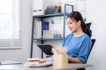 Obraz na płótnie Canvas Asian Business woman work in home. concept of tax, report, accounting, statistics, and analytical research.