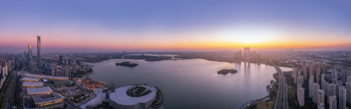 Aerial photography of the urban landscape by Jinji Lake in Suzhou under sunset