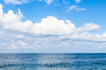 Obraz premium travel to Georgia - white clouds over Black Sea near Batumi city on autumn day