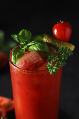 A glass with cold bloody mary cocktail