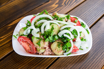 travel to Georgia - typical Georgian salad of fresh vegetables with walnut sauce in local cafe in Batumi city