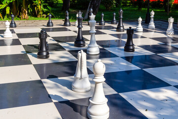 travel to Georgia - large figures of outdoor floor chess on seaside boulevard in Batumi city on...