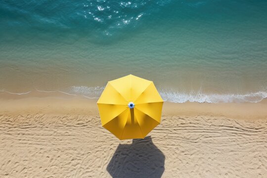 Aerial view of sandy beach with umbrella and blue water. Generative AI
